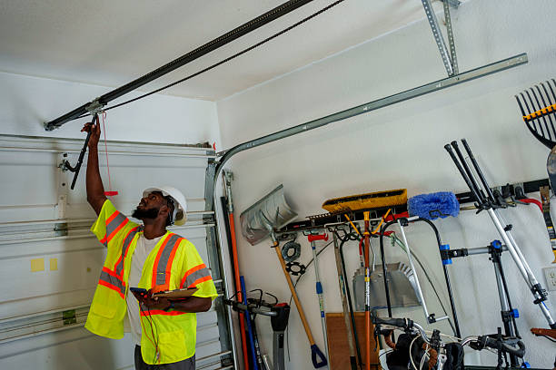 Professional Garage Door Panel Replacement technician working in North Webster, IN